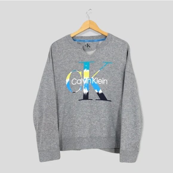 VTG Calvin Klein sz. Large Cropped Drop Shoulder Sweatshirt Blue Tie Dye - Picture 2 of 13